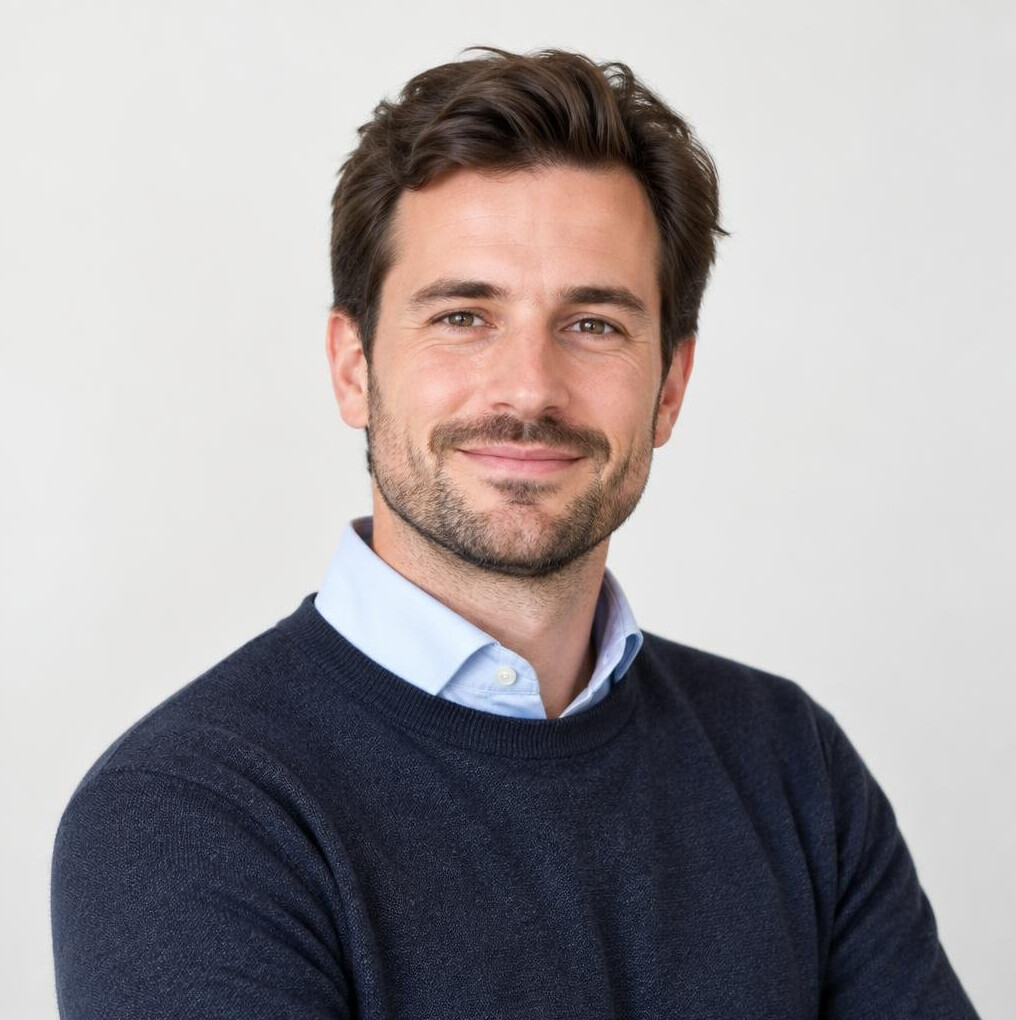 Studio portrait of a Swiss man in his 30s smiling